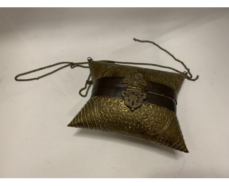 A VERY STYLISH VINTAGE PERSIAN LOOKING HANDBAG WITH VELVET INTERIOR WITH GOLD COLOURED EMBOSSING 