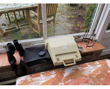 A PAIR OF 8X56 BINOCULARS, SMITH CORONA COURIER TYPEWRITER AND METAL CANDLE HOLDER 