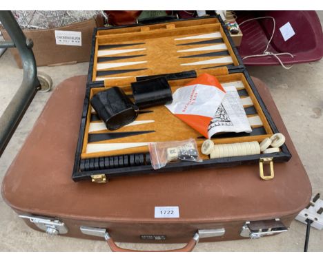 A REVALATION BRIEFCASE AND A BACKGAMMON SET 