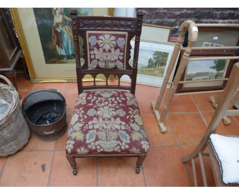 A CARVED MAHOGANY CHAIR WITH TAPESTRY SEAT 