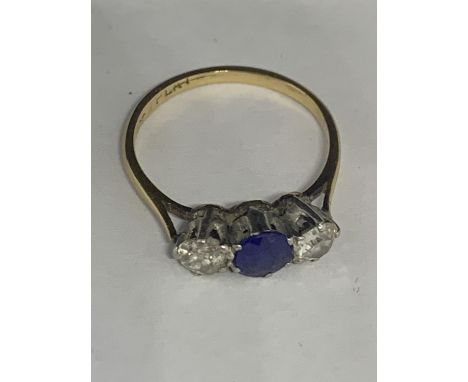 AN 18 CARAT GOLD RING WITH TWO DIAMONDS AND A SAPPHIRE SIZE J/K GROSS WEIGHT 1.8 GRAMS 