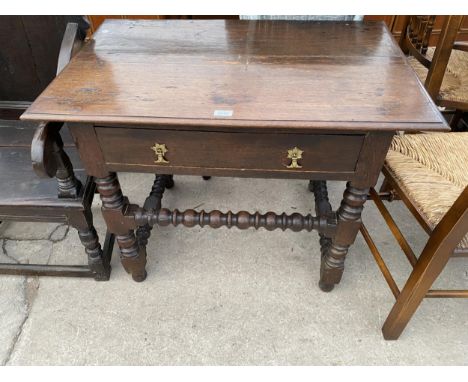 A 17TH CENTURY OAK SIDE TABLE WITH REEL AND BOBBIN TURNED STRETCHERS AND SINGLE DRAWER, 35" WIDE 