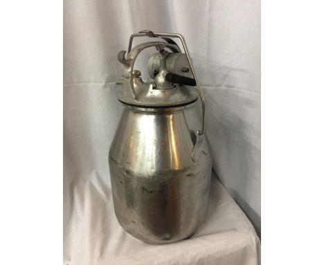A VINTAGE MILK CHURN 