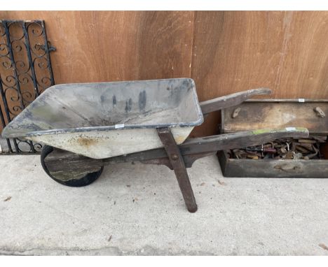 A VINTAGE WOODEN FRAMED WHEEL BARROW 