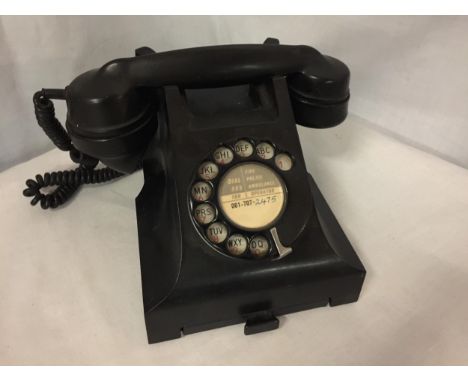 A VINTAGE BLACK 1950'S BAKELITE GPO ROTARY DIAL TELEPHONE WITH PULL OUT CARD TRAY 