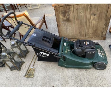 AN ATCO PETROL ENGINE LAWN MOWER WITH GRASS BOX 