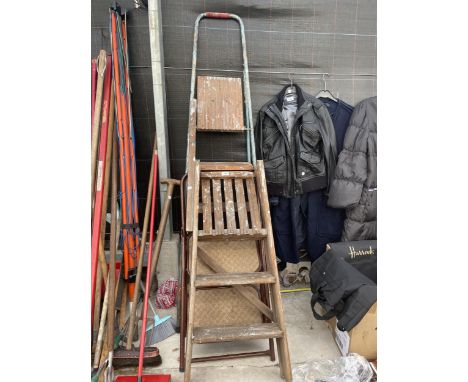 A VINTAGE WOODEN TWO RUNG STEP LADDER AND TWO FURTHER STEP LADDERS 