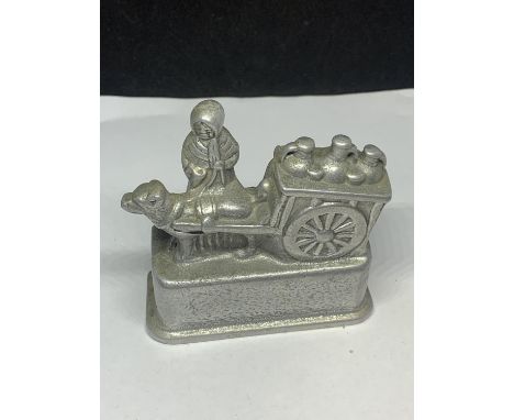 A VINTAGE 'SIXPENNY PIECE BANK' MONEY BOX 