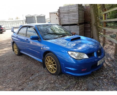 A 2007 SUBARU IMPREZA STI WRX TYPE UK IN WORLD RALLY BLUE WITH GOLD SPEEDLINE TURINI WHEELS. 2.5 LITRE FORGED ENGINE AND FULL
