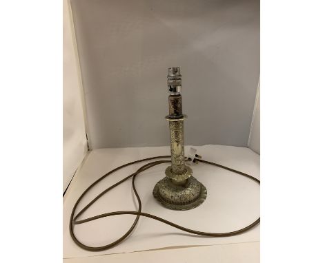 AN ORNATE WHITE METAL LAMP BASE 