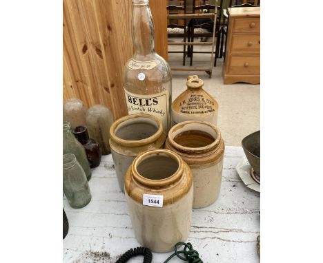 THREE VINTAGE STONEWARE VESSELS, A STONEWARE FLAGGON AND A LARGE BELLS WHISKEY BOTTLE 