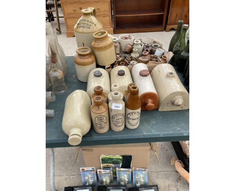 A LARGE QUANTITY OF VINTAGE STONEWARE ITEMS TO INCLUDE HOT WATER BOTTLES, BOTTLES AND A FLAGGON ETC 