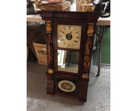 A VINTAGE STYLE WOODEN CASED WALL CLOCK WITH COLUMNS AND FLORAL DECORATED FRONT, COMPLETE WITH PENDULUM AND KEY 