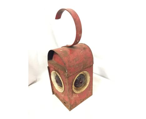 A VINTAGE RED SANDSTAR ROAD LAMP 