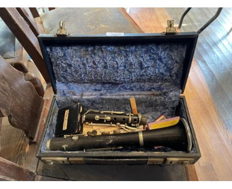 A CASED PART CLARINET WITH BOX OF REEDS 