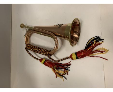 A BRASS ARMY BUGLE 