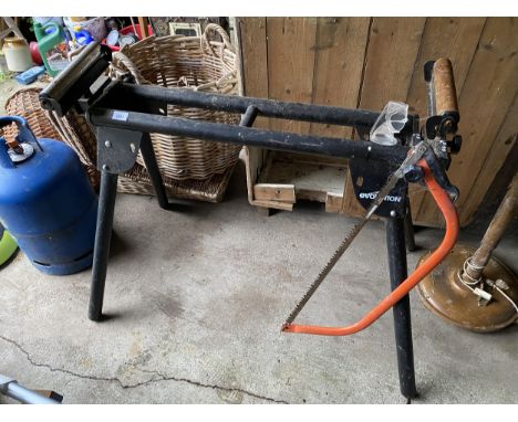 AN EVOLUTION ROLLER SAW BENCH AND A BOW SAW 