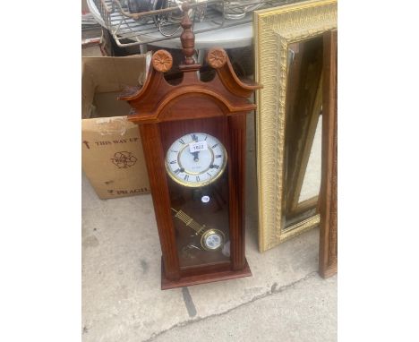 A 31 DAY WALL HANGING VIENNA STYLE CLOCK 