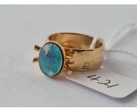 A opal doublet ring set in gold size M  3.8 gms