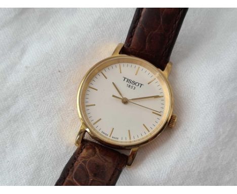 A Tissot wrist watch with seconds sweep W/O on leather strap