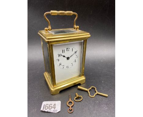 Another brass carriage clock with swing handle, 6" high