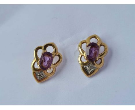 A pair of amethyst and diamond earrings 9ct  1.9 gms