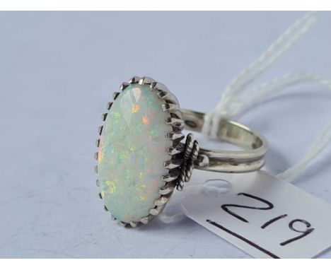 A white gold and opal ring 18ct gold size P  5.7 gms