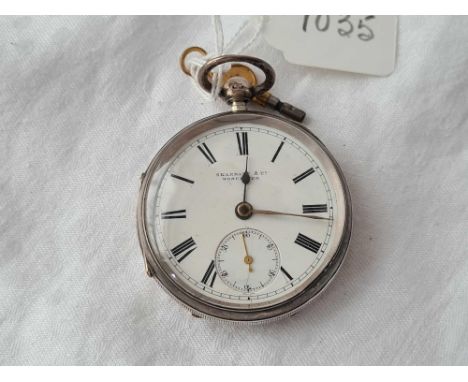 A gents silver pocket watch by Skarratt &amp; Co Worcester with seconds dial and key W/O