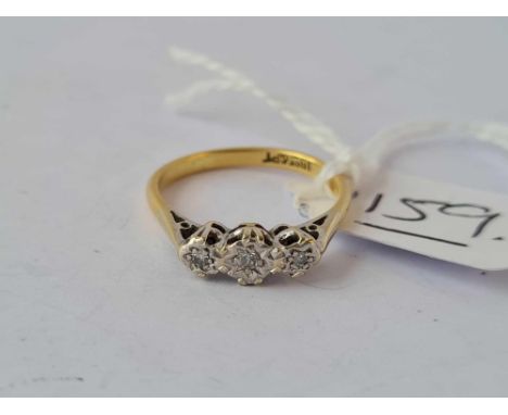 A three stone diamond ring 18ct gold size K  2.3 gms