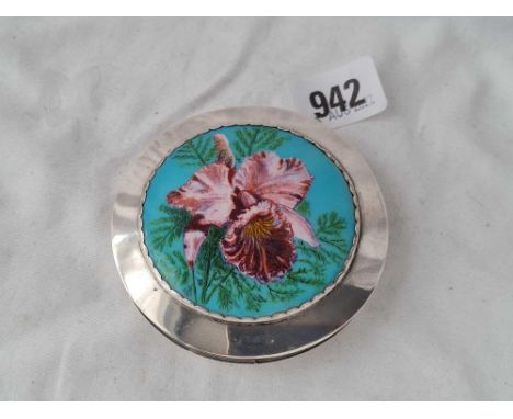 Circular compact with fitted interior and Lily decorated front. 3.25 in diam. Birmingham 1953