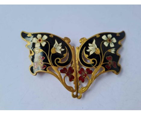 A fancy enamel belt buckle