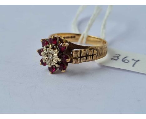 A diamond and ruby  cluster ring 9ct size R  4 gms