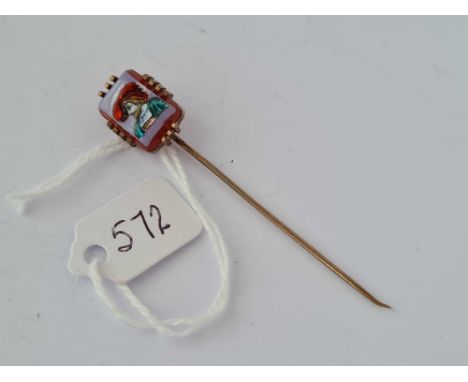 A unusual carnelian stick pin portrait of a beau set in gold