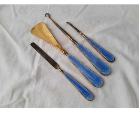 Four blue enamel silver gilt mounted manicure items