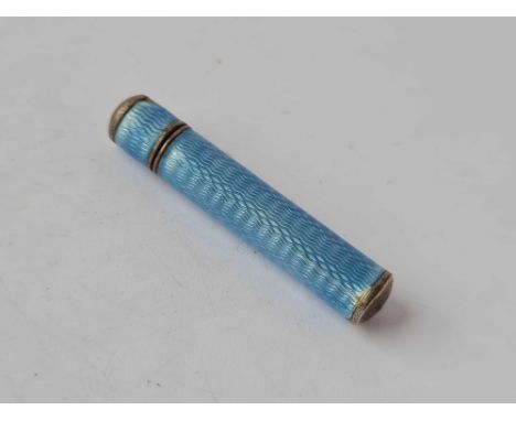 A silver and enamel needle case