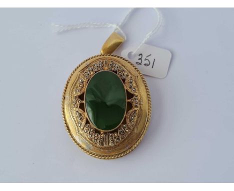 A very large Edwardian silver gilt marcasite and nephrite jade locket