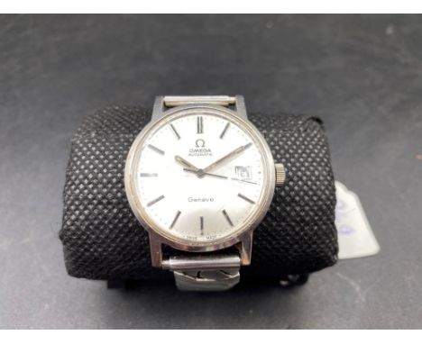 A GENTS OMEGA AUTOMATIC GENEVE with seconds sweep date aperture in W/O on expanding strap