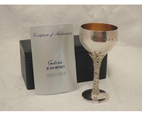 A cased 1970's silver goblet of modernist form by Christopher Lawrence having gilt interior, polished goblet with oversized h