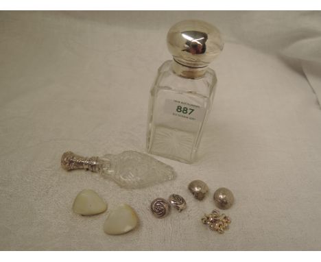 A Victorian glass bottle of rectangular form having glass stopper and silver hinged lid, Birmingham 1888, John Grinsell &amp;