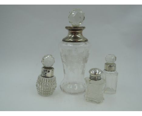 An etched glass perfume bottle having floral swag decoration, cut glass stopper and silver collar, Birmingham 1912, William H