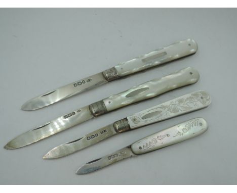 Four folding fruit knives having HM silver blades and decorative mother of pearl handles