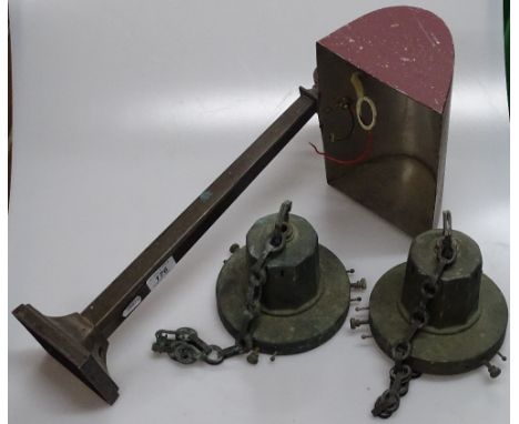 A pair of metal hanging light fittings and an adjustable desk lamp with metal shade