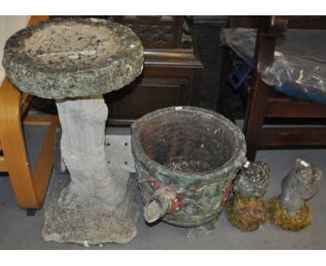 A weathered concrete 2-section birdbath, planter and pair of ornaments (4)