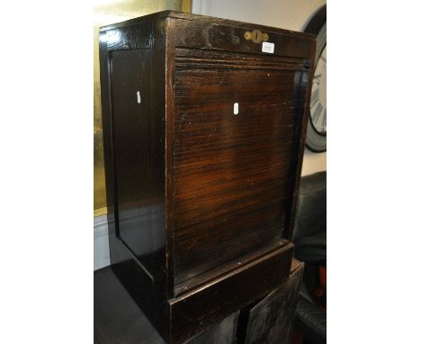 An Edwardian oak tambour front filing cabinet, width 45 cm