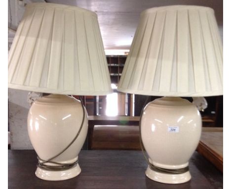 A pair of ceramic Accoustimas 120W speaker lamps with B&O internal speakers