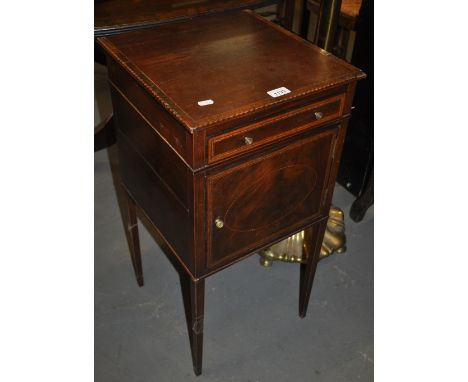 A late Victorian Irish mahogany bedside cabinet with satinwood cross banding and inlaid stringing, having a single drawer wit