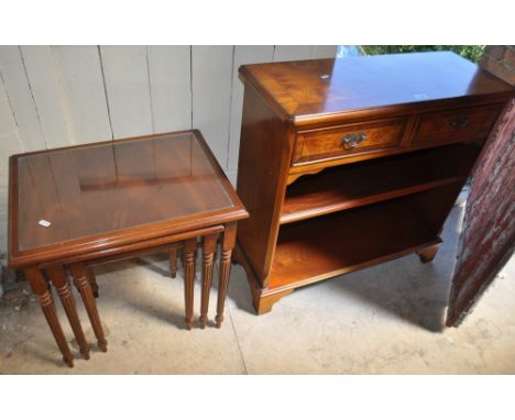 A reproduction yew wood cabinet with drawers and open shelves, and a mahogany nest of 3 occasional tables