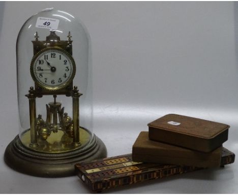 A brass 400-day mantel clock under-glass dome, a First War period Christmas tin 1914, an inlaid cribbage board and cased Wate