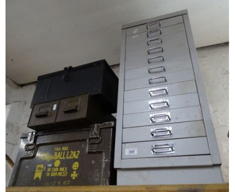 A metal 12 drawer filing cabinet, military amo box, deed box and a filing index box