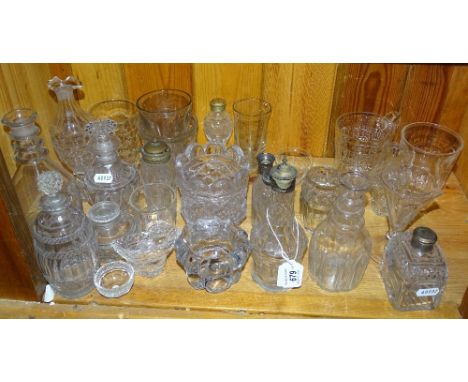 A shelf of Victorian condiments, small decanters etc